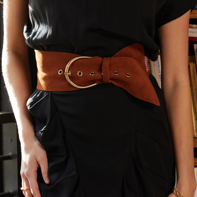 Our Austen belt in black suede is a wide waist statement belt with seven holes.